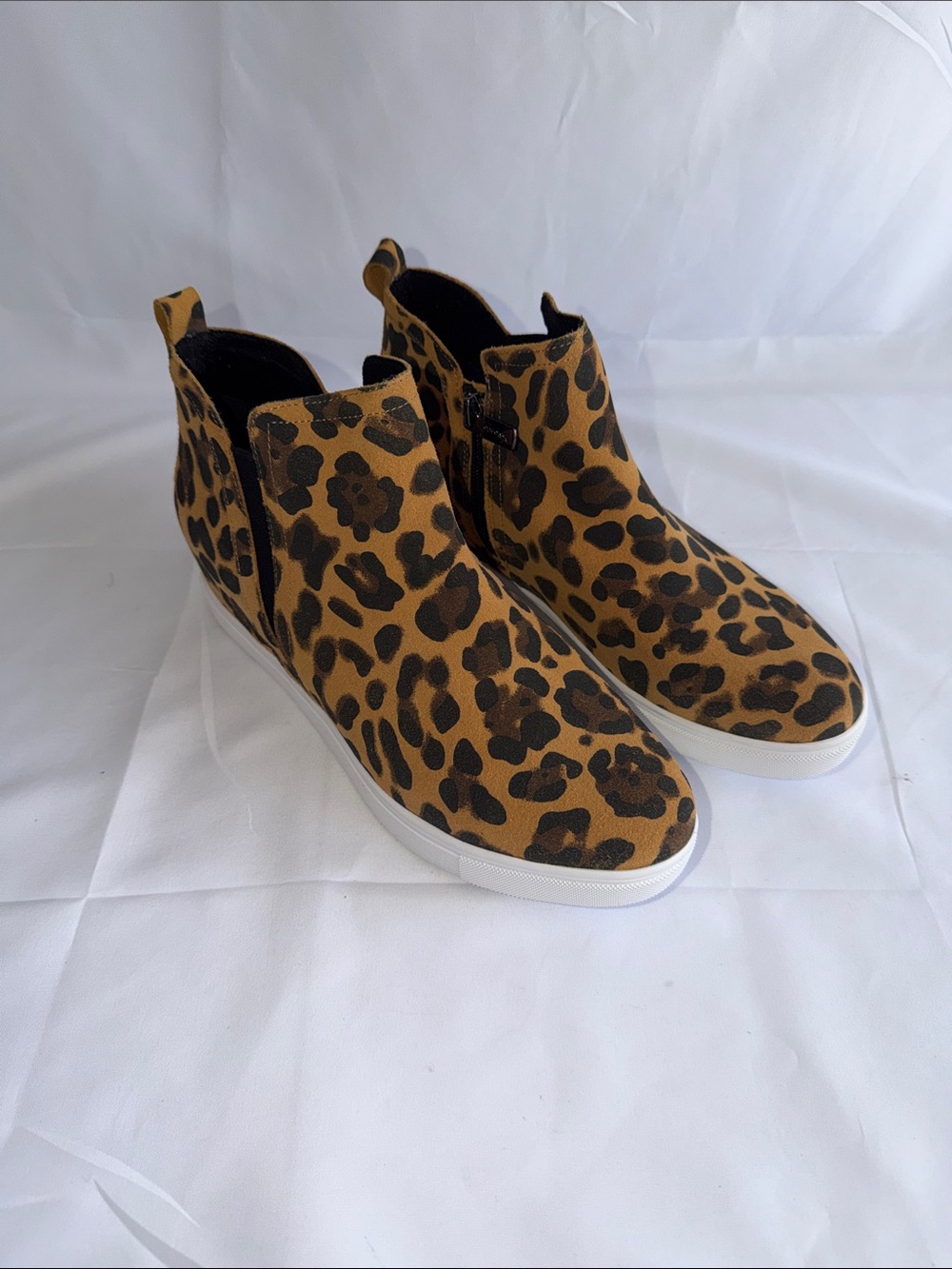 Blondo Leopard Print Slip-On Wedge Sneakers in Brown and Black